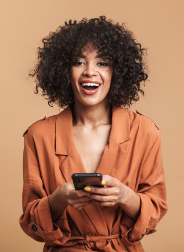 Happy Women Using Mobile Phone